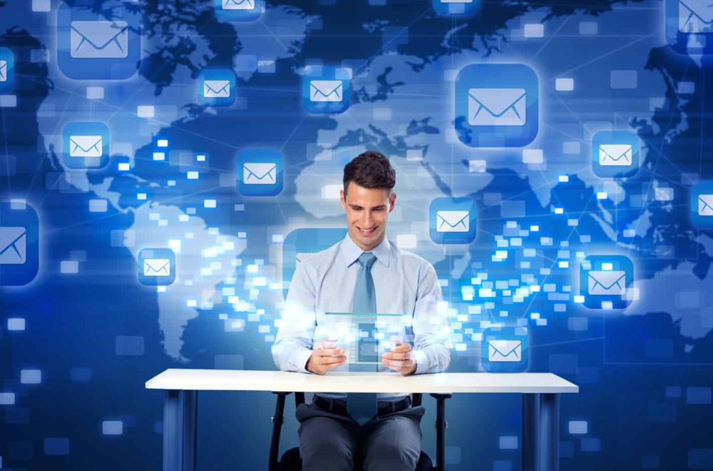 Smiling,Man,With,Futuristic,Digital,Tablet,,Global,Communication,With,Mail